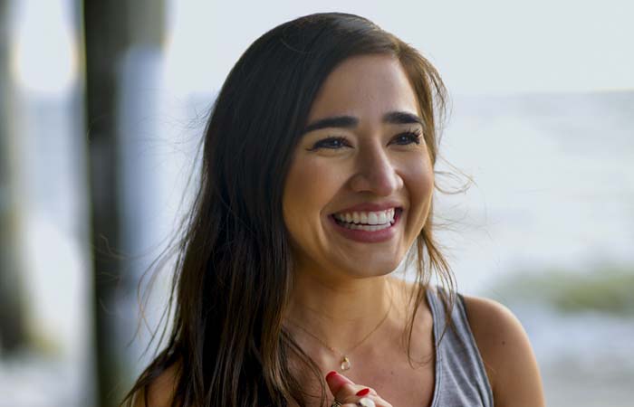 Woman smiling outside