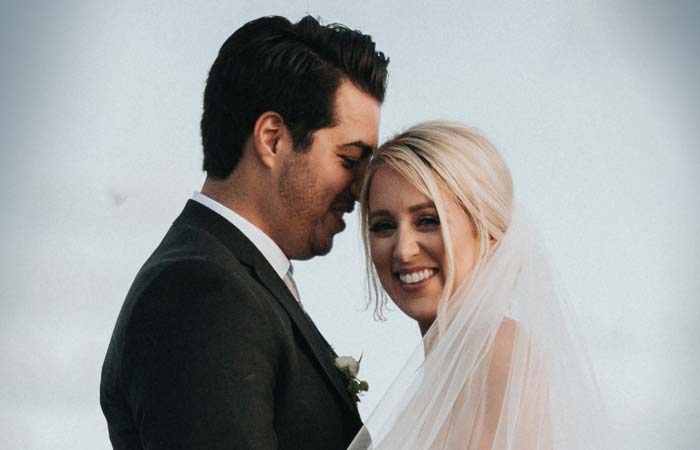 bride and groom smiling